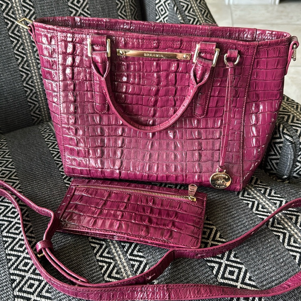 Brahmin purse and matching wallet with long strap for the purse.
